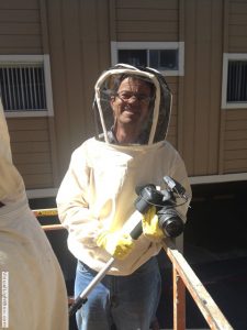 photographer with bee suit